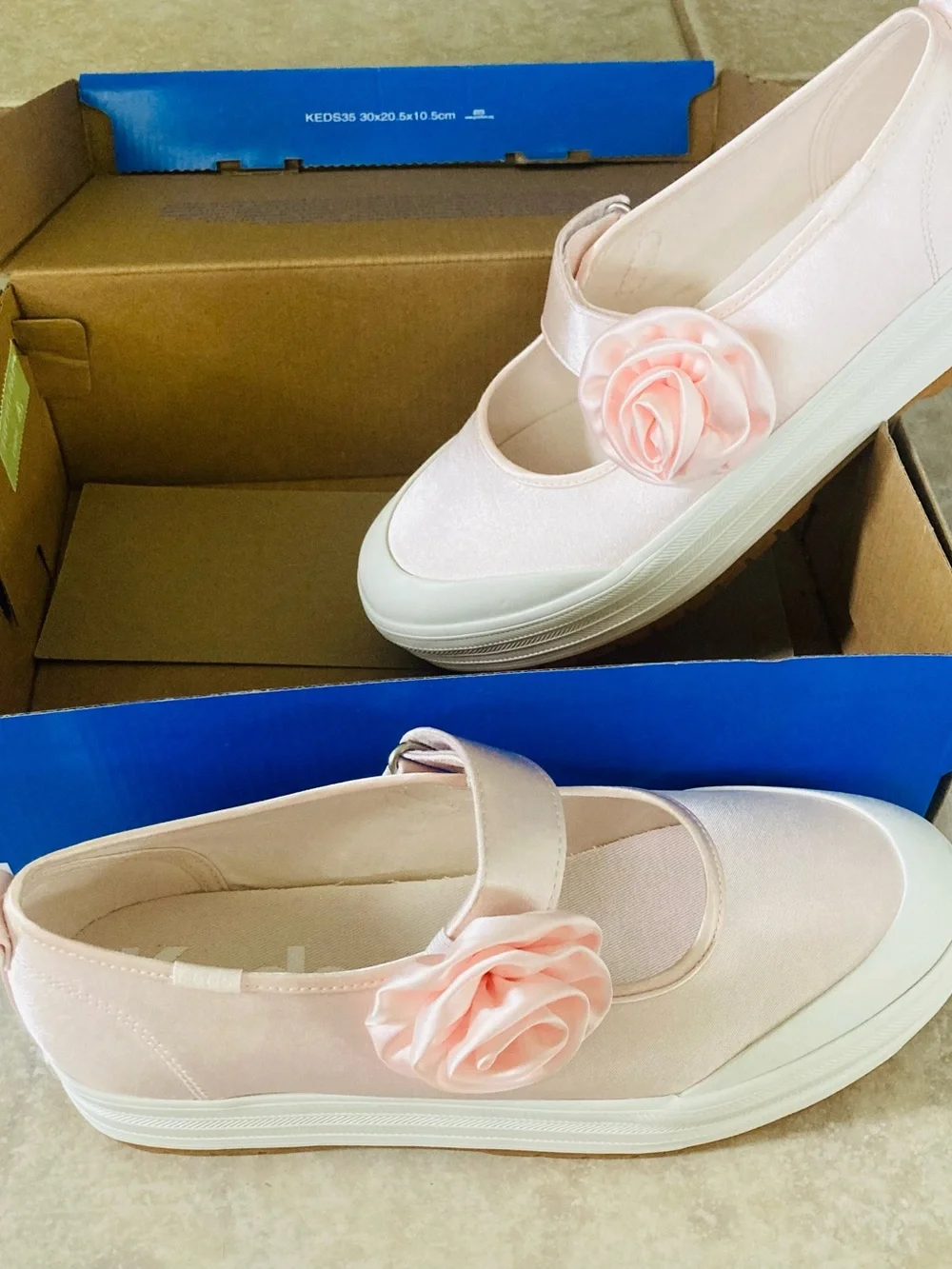 Keds Pale Pink Slip-On Platform Sneakers with Rose Accent
